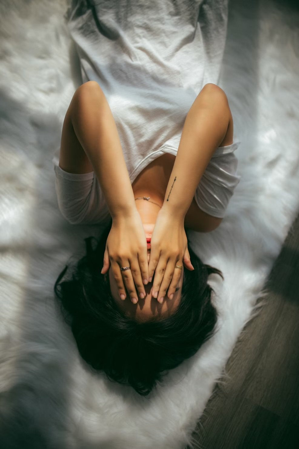 Woman ruminating at night